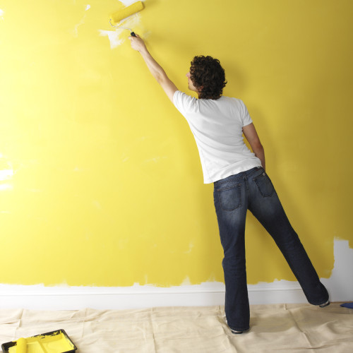 Man painting wall